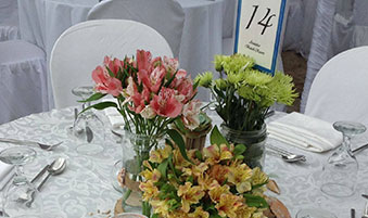 Flowers and Greens’ Centerpieces for a Laiya Beach Wedding